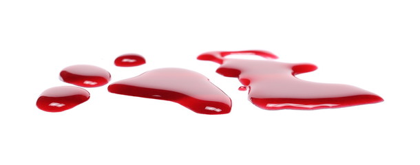 Spilled red wine puddle isolated on white background 