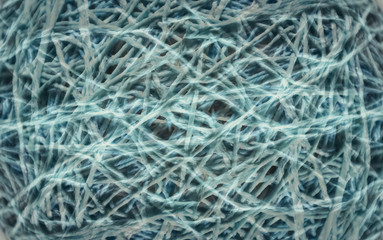 Abstract pastel blue background of cotton or wool threads