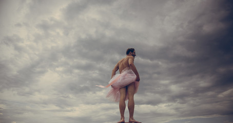 Funny man freak. Man in ballerina skirt outdoor. Crazy ballerina. drag queen. Inspiration and dreaming. Man dancing in tutu in ballet studio. Enjoying carefree time. playful guy. happiness. © Volodymyr
