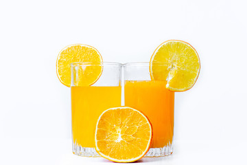 different fruit and juice or smoothie in a glass