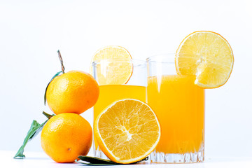 different fruit and juice or smoothie in a glass