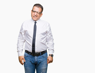 Middle age bussines arab man wearing glasses over isolated background winking looking at the camera with sexy expression, cheerful and happy face.