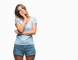 Young beautiful woman over isolated background thinking looking tired and bored with depression problems with crossed arms.