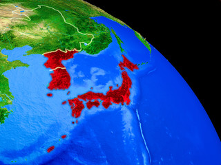 Japan and Korea on planet Earth from space with country borders. Very fine detail of planet surface.