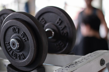 Dumbbells in a rack at the gym