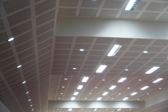 Many ceiling lights in the auditorium.