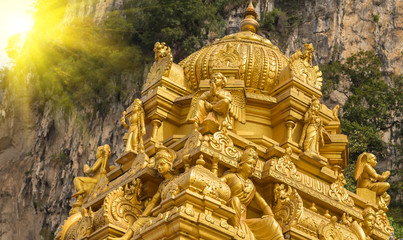 Golden sun  Indian temple Batu Caves
