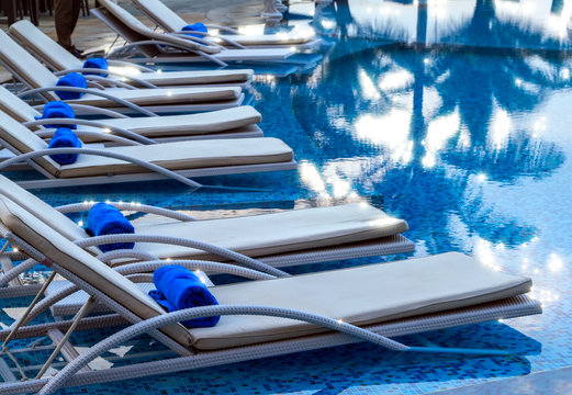 Sun-beds in swimming pool