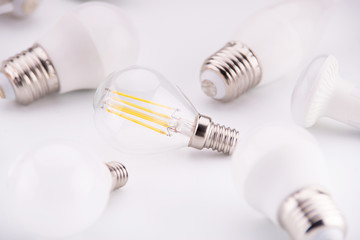 Led lamps lie on a white background. Theme energy saving in the house