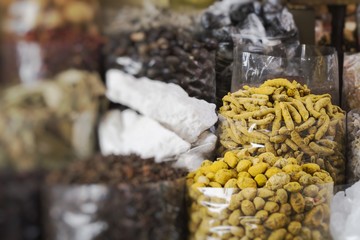 Dried herbs, flowers and arabic spices in the souk in Dubai. Selective Focus.