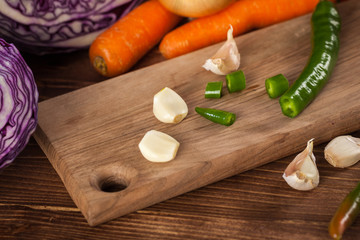 Verious fresh vegetables on a wooden table, healthy food