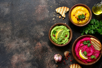 Assortment of hummus.Top view with copy space.
