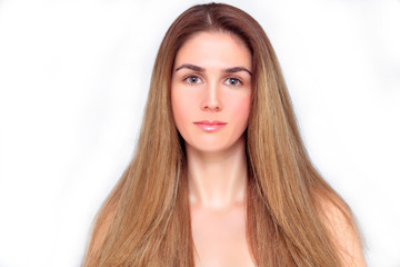 Fototapeta premium Portrait of a beautiful woman with open blond and long hair