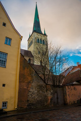 Tallinn, Estonia: Church of St. Olaf. Street of the old town and steeple of the Church