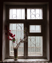 Old wooden window in the dark room as background