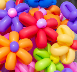 Fototapeta na wymiar Multicolored flowers from balloons as background