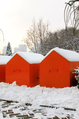 Orange bins in the snow