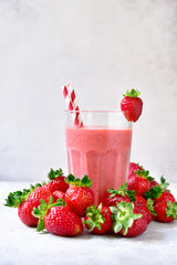 Strawberry banana smoothie in a tall glass.