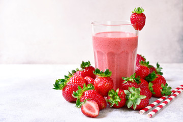 Strawberry banana smoothie in a tall glass.