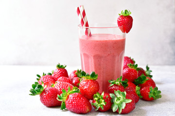 Strawberry banana smoothie in a tall glass.