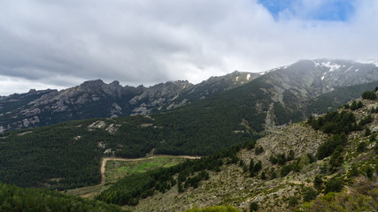 Fototapeta na wymiar mountain range with snow on the summits in spring