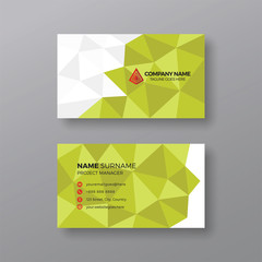 Professional business card template with green geometric