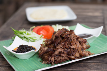 Succulent crispy duck, plum sauce, chilli oil, spring onion , cucumber, pancake wraps.