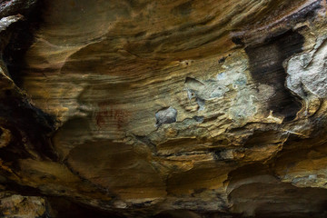 Aboriginal man hand print in the Red Hands cave in Ku-ring-ai Chase National Park, Sydney,...