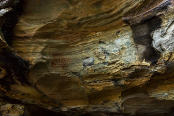 Aboriginal man hand print in the Red Hands cave in Ku-ring-ai Chase National Park, Sydney, Australia.