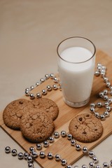 Cookie with milk on the table for Santa Claus