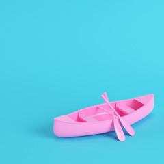 Pink canoe with paddles on bright blue background in pastel colors