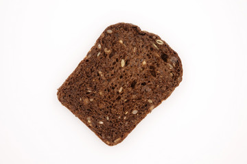 black bread with seeds on white background