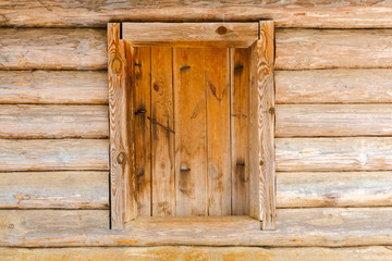 background - wooden door in the log wall