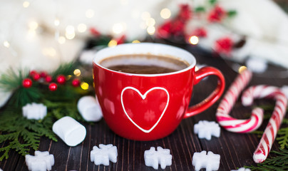Cup of hot chocolate. Red cup with white heart.