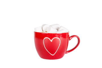 Cup of hot chocolate with marshmallow. Red cup with white heart. Isolated on white.