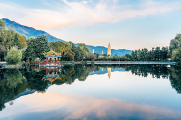 Reflected scenery of Santa Pagoda Park of Chongsheng Temple in Dali, Yunnan, China © Govan