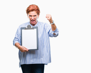 Senior caucasian business woman holding clipboard over isolated background annoyed and frustrated shouting with anger, crazy and yelling with raised hand, anger concept