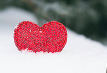 Valentines Day love heart in winter in the snow from above