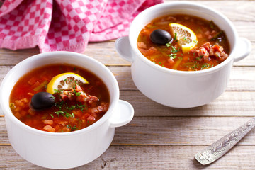 Russian dish  solyanka - thick, spicy and sour saltwort soup. horizontal