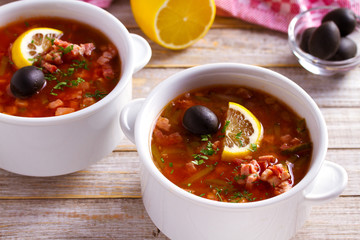 Russian dish  solyanka - thick, spicy and sour saltwort soup. horizontal