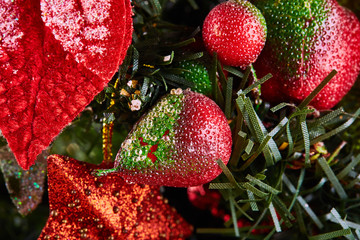 Colorful decorations on Christmas tree. New Year traditions