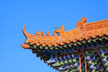 Yellow glazed tile dragon head sculpture