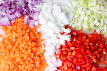 Onion carrots daikon pepper red cut chopped cook preparation close up
