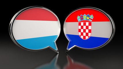 Obraz premium Luxembourg and Croatia flags with Speech Bubbles. 3D illustration