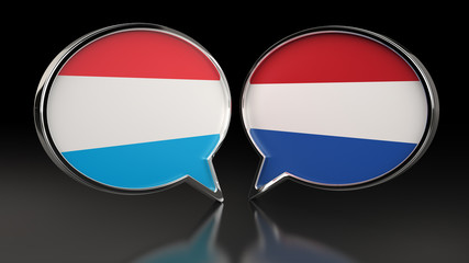 Fototapeta premium Luxembourg and Netherlands flags with Speech Bubbles. 3D illustration