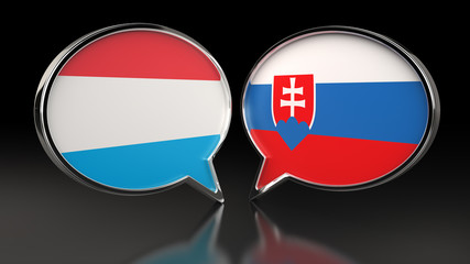 Obraz premium Luxembourg and Slovakia flags with Speech Bubbles. 3D illustration