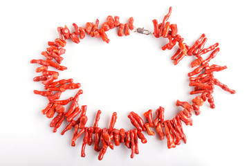 Fototapeta na wymiar red coral beads isolated on white background
