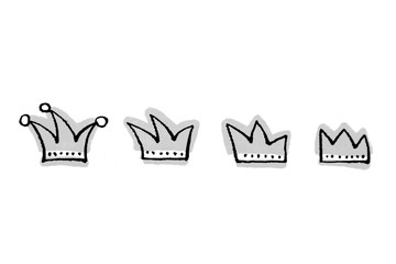 Four crowns of different sizes.