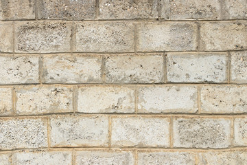 A wall of gray concrete blocks. Close-up.