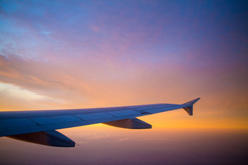 Fototapeta na wymiar Airplane over the sunset